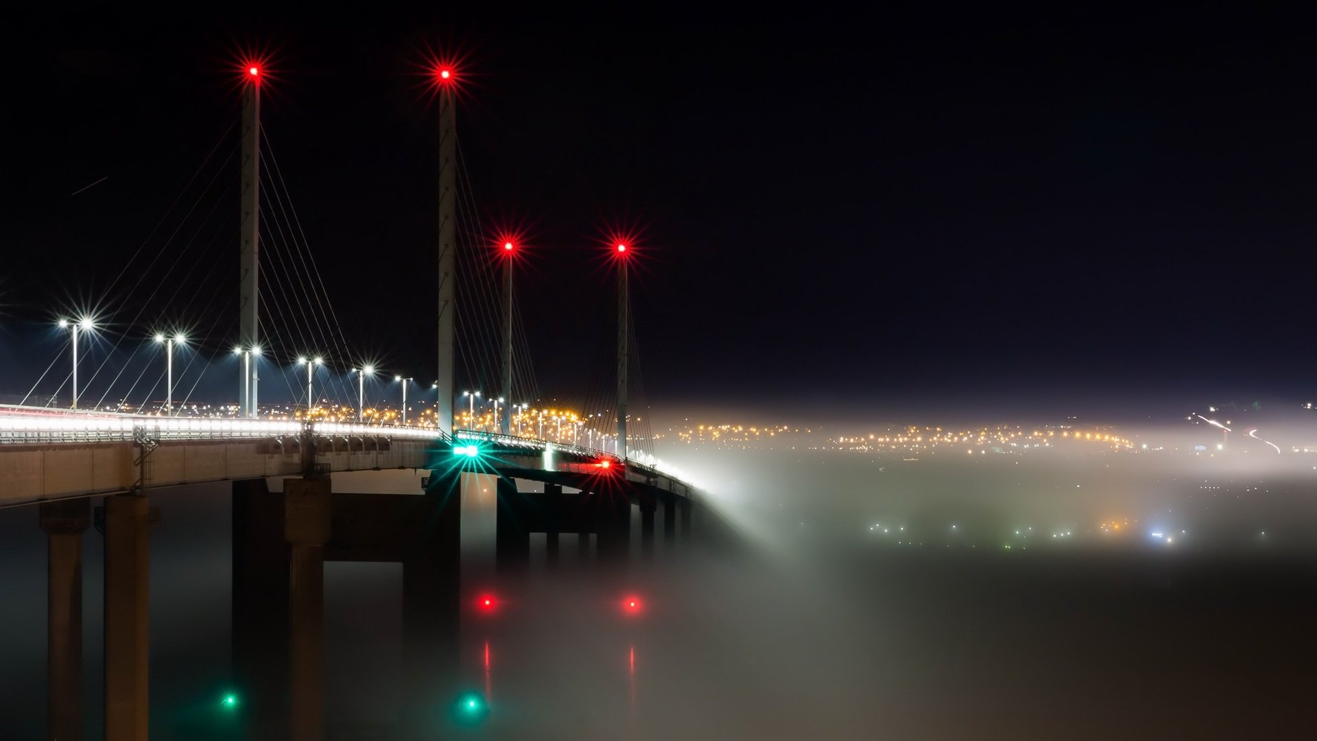 Обои огни, туман, мост, транспорт, шотландия, kessock, into the mist, кесок, lights, fog, bridge, transport, scotland, kasok разрешение 2560x1440 Загрузить