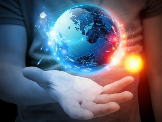 Обои земной шар в руке, globe in hand разрешение 2560x1440 Загрузить