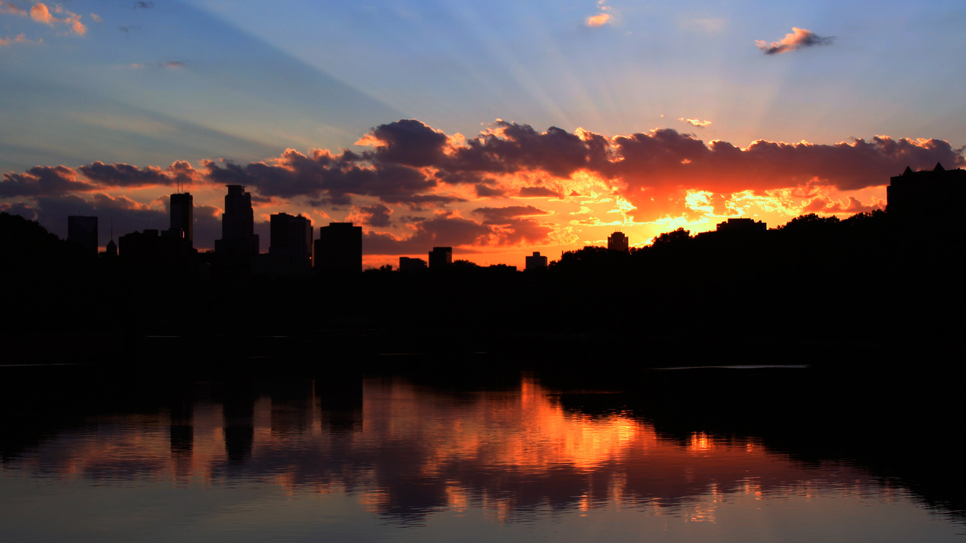 Обои небо, облака, река, закат, море, город, здание, the sky, clouds, river, sunset, sea, the city, the building разрешение 1920x1080 Загрузить