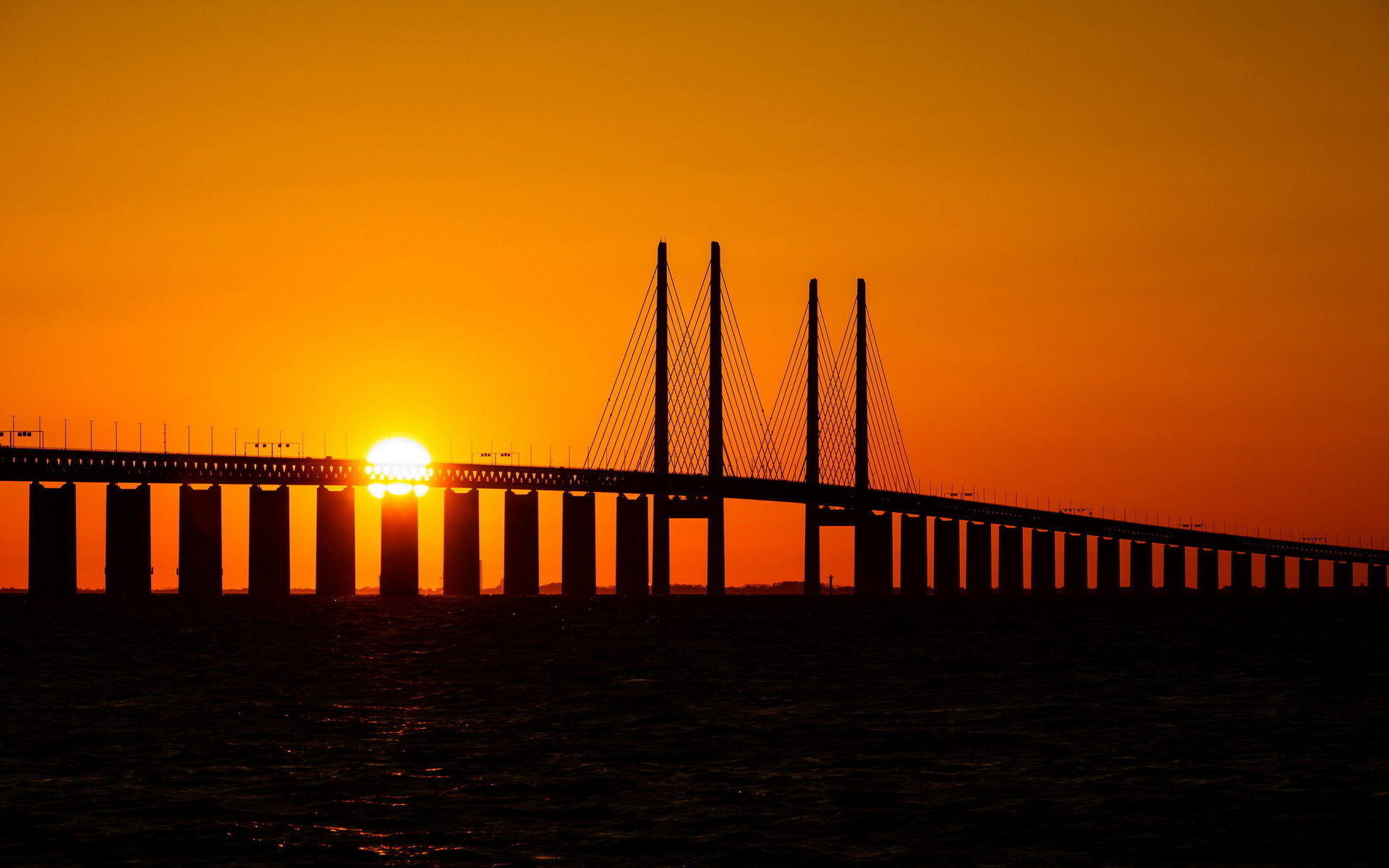 Обои закат, мост, дания, эресуннский, sunset, bridge, denmark, öresund разрешение 1920x1200 Загрузить