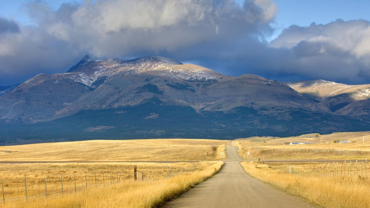 Обои дорога, облака, горы, природа, тучи, вершины, road, clouds, mountains, nature, tops разрешение 1920x1080 Загрузить
