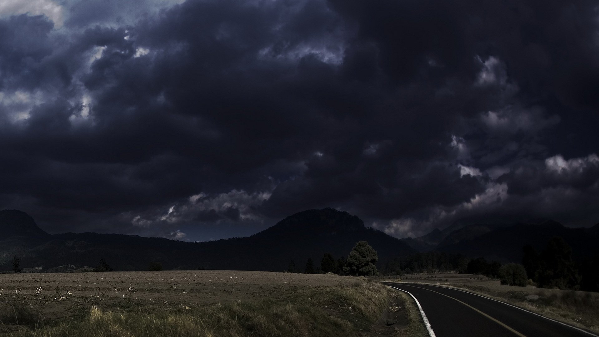 Обои дорога, облака, поле, грусть, тьма, road, clouds, field, sadness, darkness разрешение 1920x1200 Загрузить