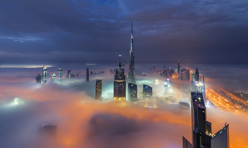 Обои облака, огни, вечер, город, дома, дубай, оаэ, дымка.туман, clouds, lights, the evening, the city, home, dubai, uae, haze.fog разрешение 2048x1455 Загрузить